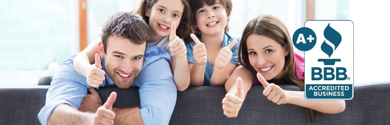Happy family giving thumbs up after being mold free